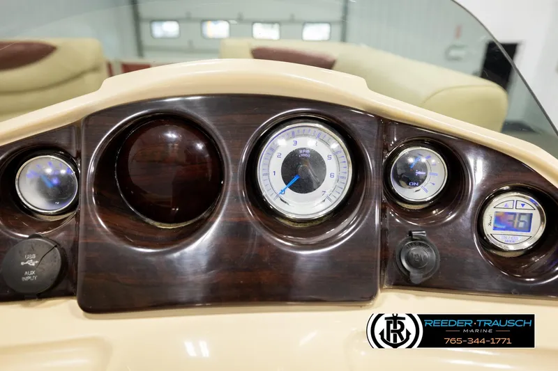 Slide: The Image of Dashboard of 2017 Sylvan 818 Mirage CR boat with gauges and controls. - 27