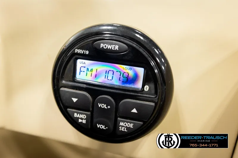 Slide: The Image of Close-up of a 2017 Sylvan 818 Mirage CR radio display showing FM 107.7. - 28