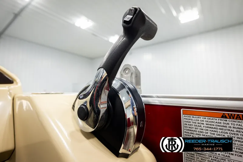 Slide: The Image of Close-up of throttle control on 2017 Sylvan 818 Mirage CR boat, indoors. - 30
