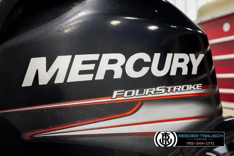 Slide: The Image of Mercury FourStroke engine on 2017 Sylvan 818 Mirage CR boat, Reeder-Trausch Marine logo visible. - 38