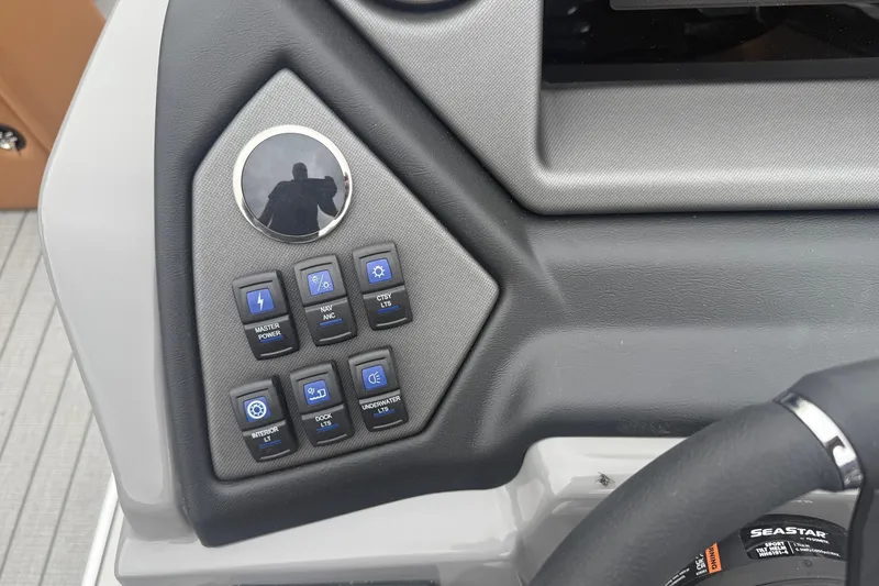 Slide: The Image of Control panel of 2026 Sylvan L-3 DLZ DH boat with various function buttons. - 14