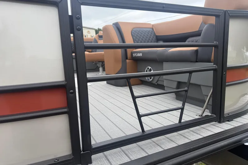Slide: The Image of 2026 Sylvan L-3 DLZ DH pontoon boat with stylish seating and modern design. - 24