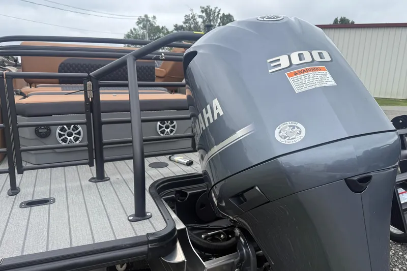 Slide: The Image of 2026 Sylvan L-3 DLZ DH boat with Yamaha 300 outboard motor, rear deck view. - 5