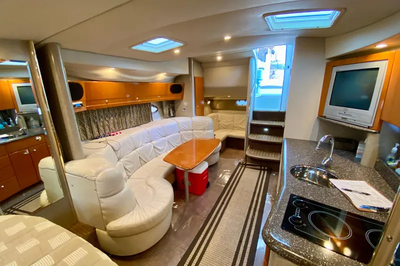 Slide: The Image of Luxurious interior of a 2004 Formula 37 PC yacht with modern amenities and elegant design. - 30