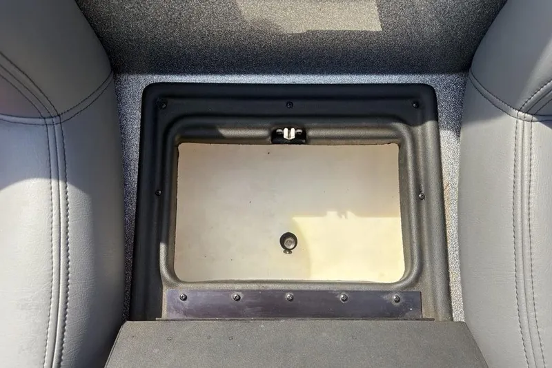 Slide: The Image of Storage compartment in a 2008 Skeeter ZX190 boat interior. - 22