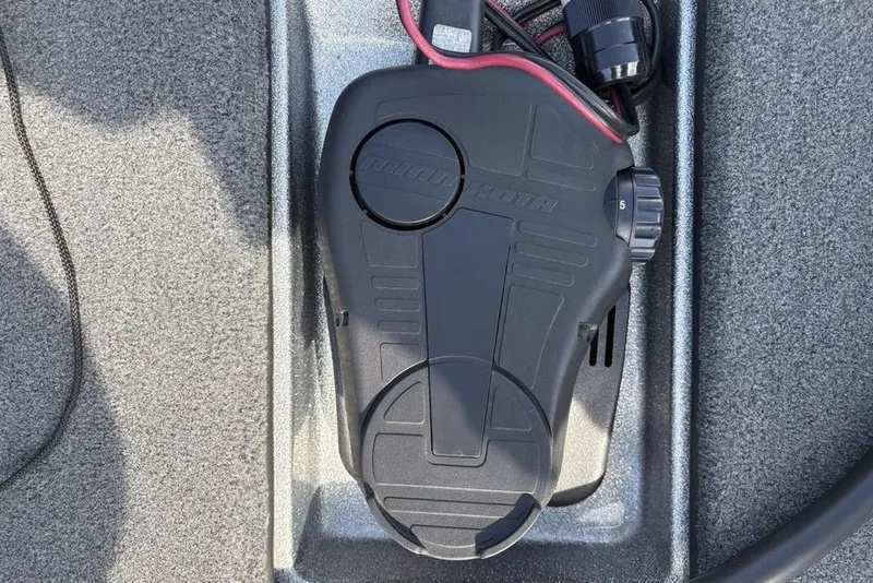 Slide: The Image of 2008 Skeeter ZX190 boat foot pedal control on textured surface. - 3