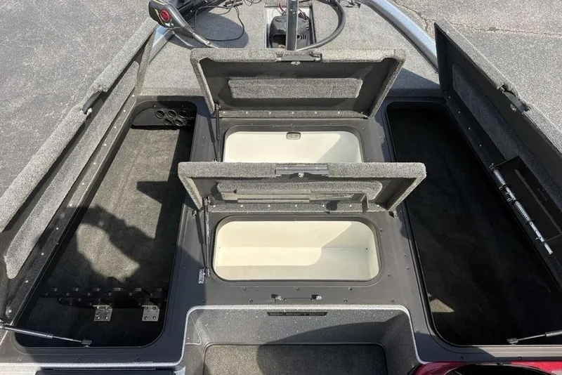 Slide: The Image of 2008 Skeeter ZX190 boat storage compartments open, showcasing spacious interior layout. - 8