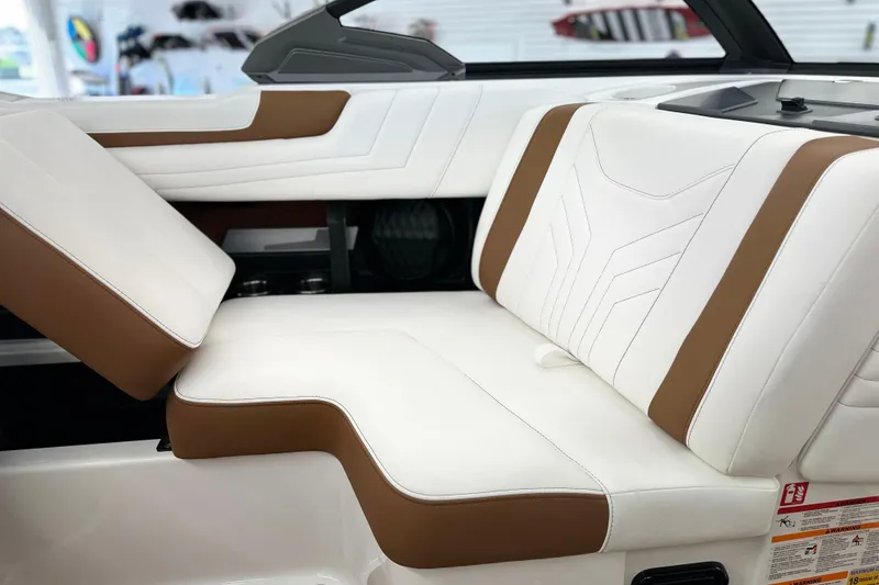 Slide: The Image of 2026 Malibu Wakesetter 25 LSV interior with white and brown leather seating. - 15