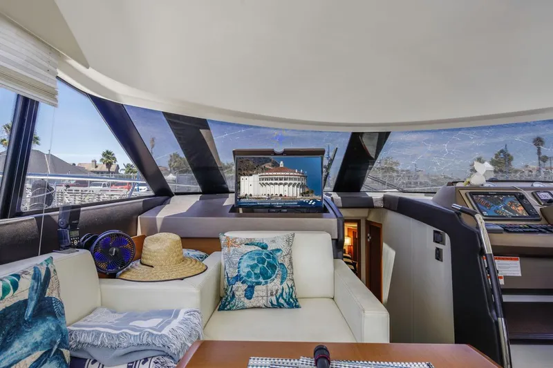 Slide: The Image of Luxurious interior of 2015 Prestige 500FB yacht with nautical decor and modern navigation equipment. - 36