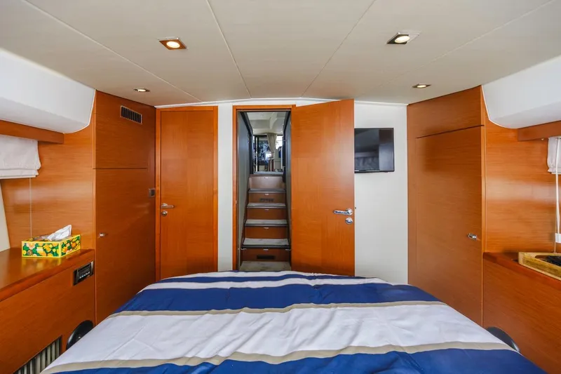 Slide: The Image of Luxurious interior of 2015 Prestige 500FB yacht cabin with wooden finishes and modern design. - 39