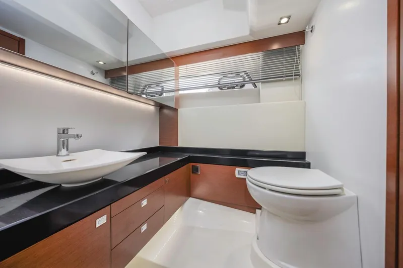 Slide: The Image of Luxurious bathroom in 2015 Prestige 500FB yacht with modern fixtures and sleek design. - 51