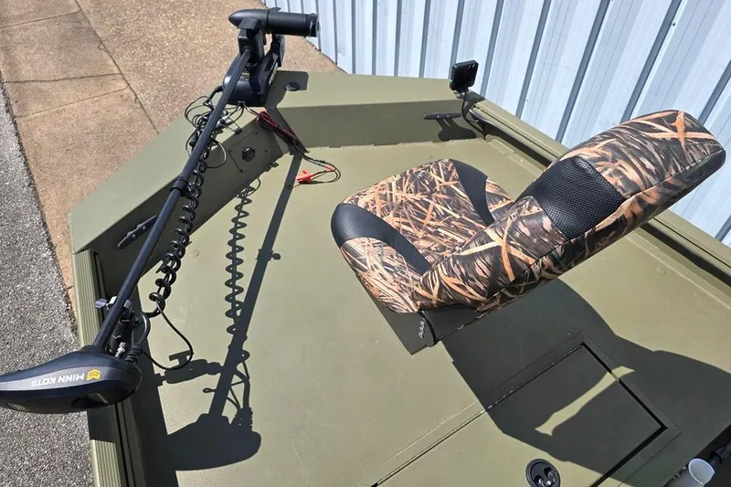 Slide: The Image of 2022 Lowe Roughneck RX1860 Rambler boat with camo seat and trolling motor. - 3