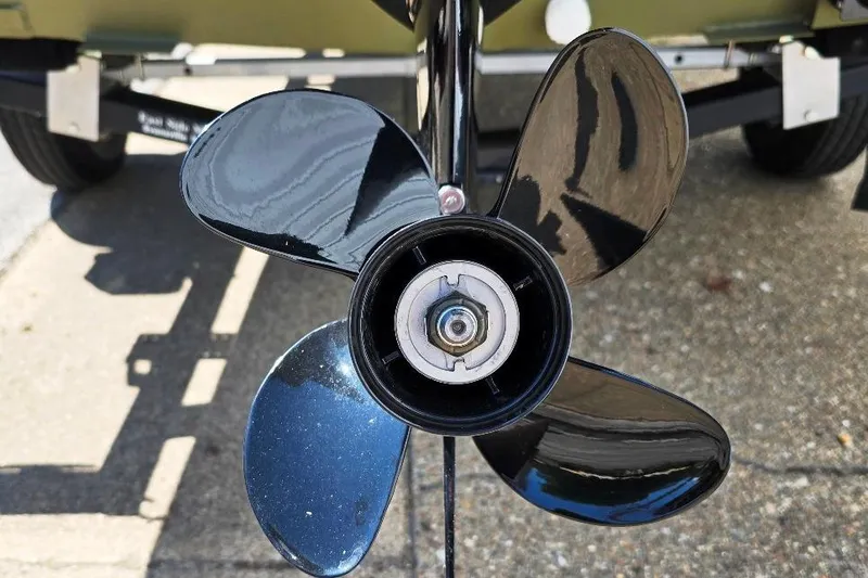 Slide: The Image of Close-up of a 2022 Lowe Roughneck RX1860 Rambler boat propeller. - 9