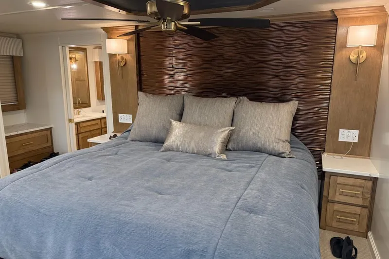 Slide: The Image of Luxurious bedroom in 2025 Sumerset Excellence Multiple Shares houseboat, featuring modern decor and amenities. - 18