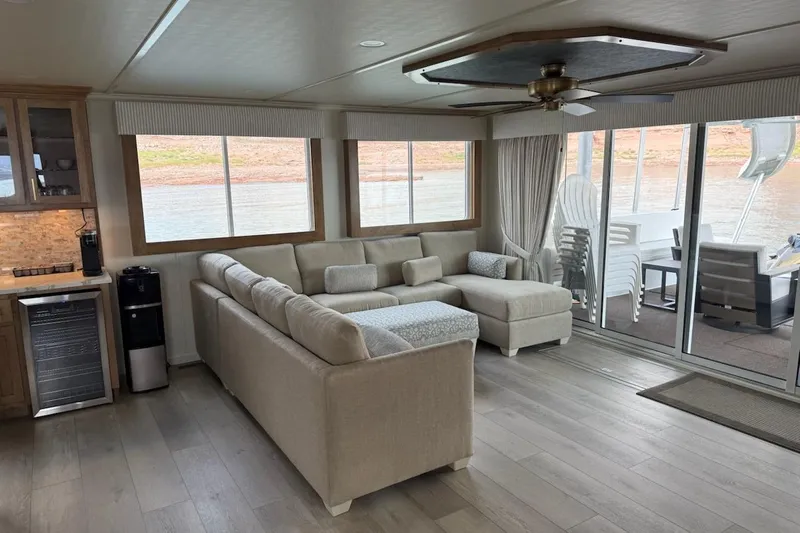Slide: The Image of Luxurious 2025 Sumerset Excellence houseboat interior with modern furnishings and scenic water views. - 27