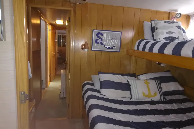 Slide: The Image of Cozy cabin interior of 1965 Tacoma Boat Works Bill Garden Motor Yacht with nautical decor. - 22