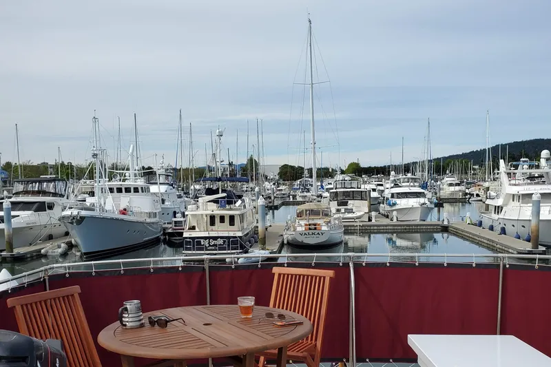 Slide: The Image of Marina view with Tacoma Boat Works 1965 Bill Garden Motor Yacht, surrounded by other boats. - 25