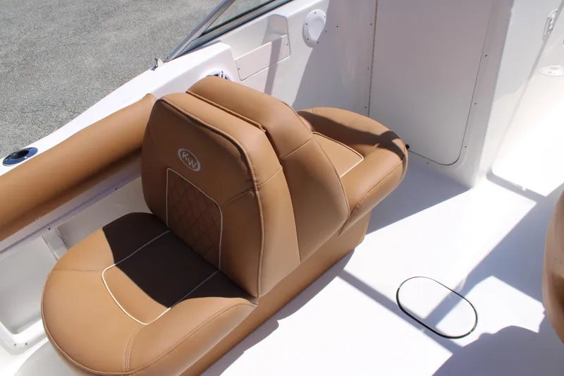 Slide: The Image of Luxurious tan seating on 2026 Key West 203 DFS boat interior. - 14