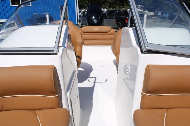 Slide: The Image of Interior view of 2026 Key West 203 DFS boat with tan leather seating. - 16
