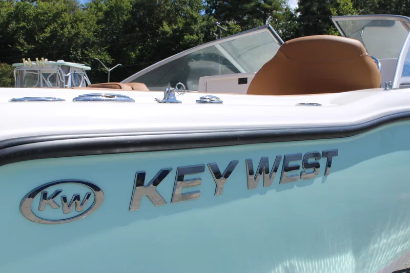 Slide: The Image of 2026 Key West 203 DFS boat with sleek design and chrome lettering. - 29