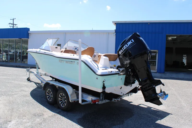Slide: The Image of 2026 Key West 203 DFS boat with Suzuki outboard motor on trailer. - 3