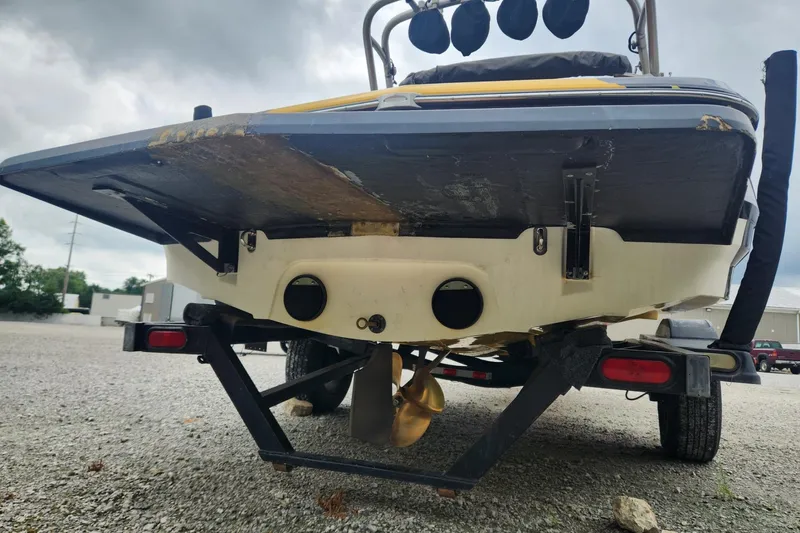Slide: The Image of 2006 MasterCraft MariStar 200 boat trailer hitch on gravel surface. - 5