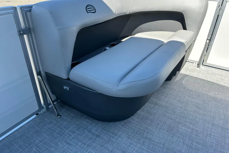 Slide: The Image of 2026 Sun Tracker Party Barge 16 DLX interior seating with gray upholstery. - 8