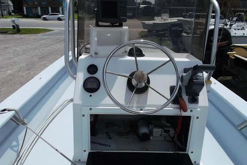 Slide: The Image of Steering console of a 2008 Hancock 22 boat with navigation equipment. - 7