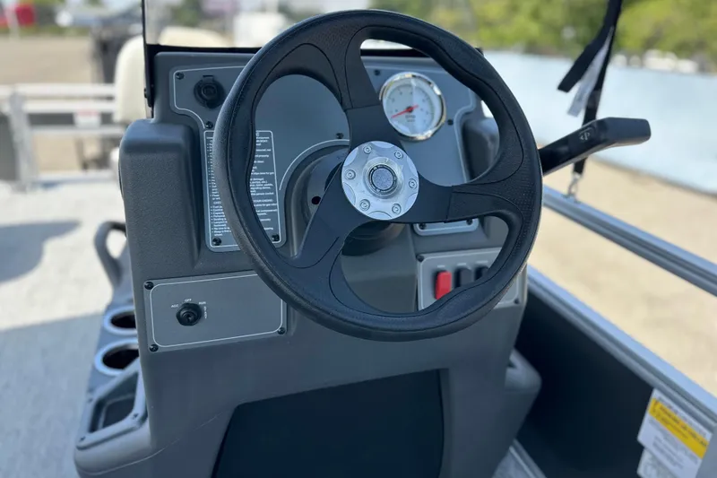 Slide: The Image of Steering console of 2026 Sun Tracker Bass Buggy 16 DLX pontoon boat. - 11