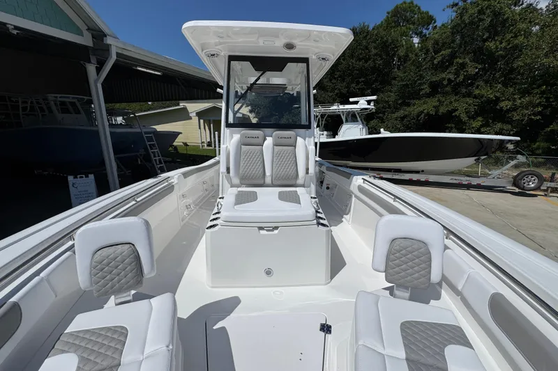 Slide: The Image of 2026 Caymas 291 boat interior with modern seating and sleek design. - 23
