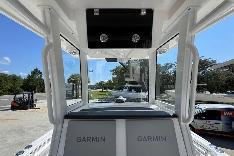 Slide: The Image of 2026 Caymas 291 boat interior with Garmin equipment, showcasing modern design and technology. - 31