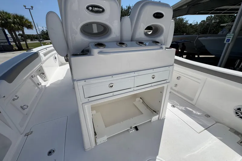 Slide: The Image of 2026 Caymas 291 boat interior with storage compartments and seating. - 34