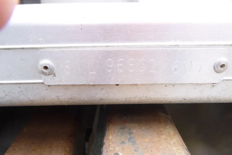 Slide: The Image of Close-up of a metal identification plate on a 2007 SunChaser 8520 Cruise. - 14