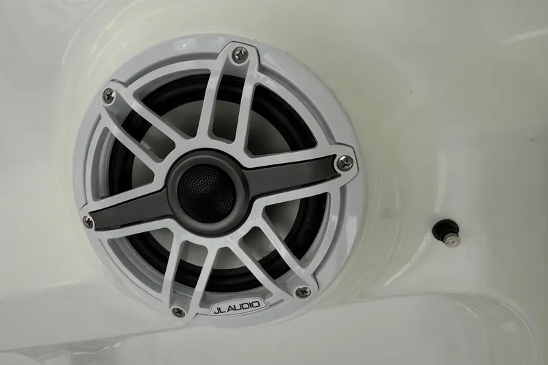 Slide: The Image of JL Audio speaker on 2026 Sea Hunt Ultra 305 SE boat interior. - 19