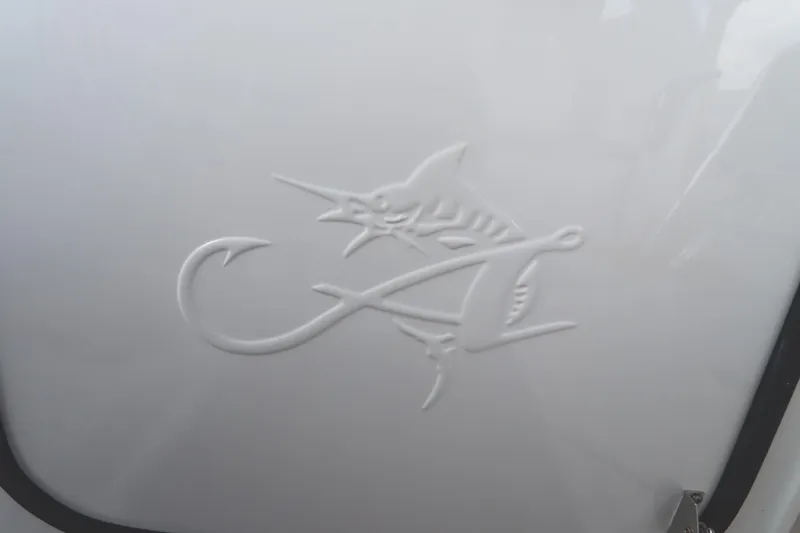 Slide: The Image of 2024 Albemarle 30 Express boat docked by a scenic riverbank. - 19