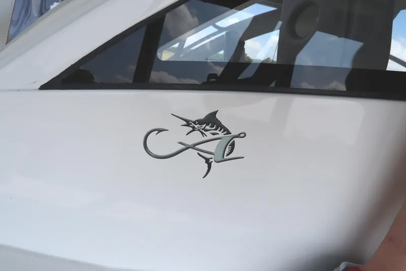 Slide: The Image of Embossed marlin logo on 2024 Albemarle 30 Express boat surface. - 20