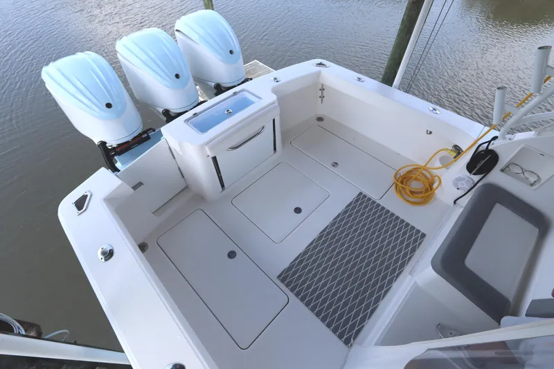 Slide: The Image of 2024 Albemarle 30 Express boat with marlin and hook logo on white surface. - 21