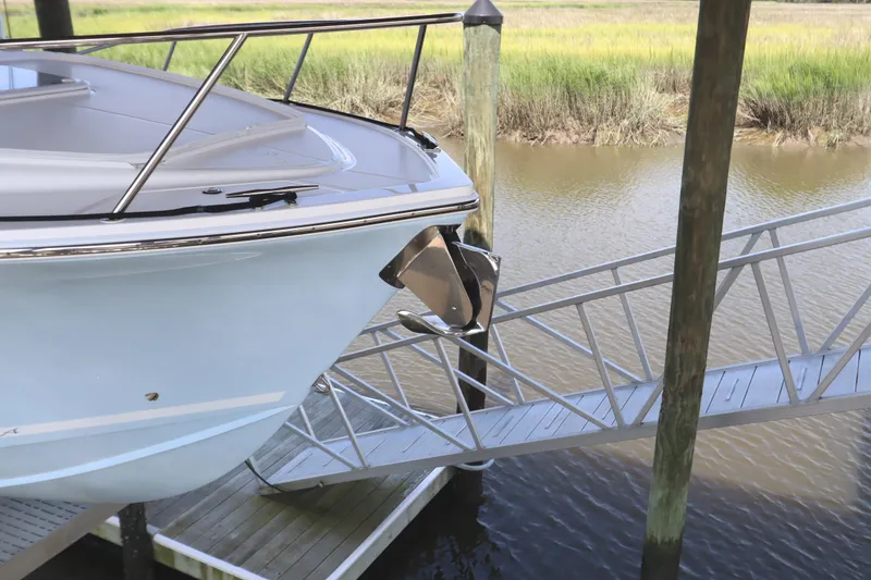 Slide: The Image of 2024 Albemarle 30 Express boat docked, showcasing sleek design and modern features. - 3