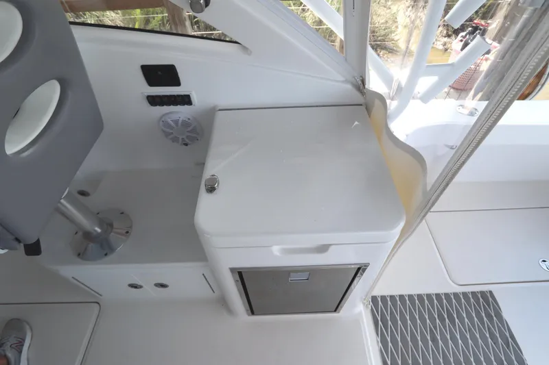 Slide: The Image of 2024 Albemarle 30 Express boat interior with modern helm and seating. - 39