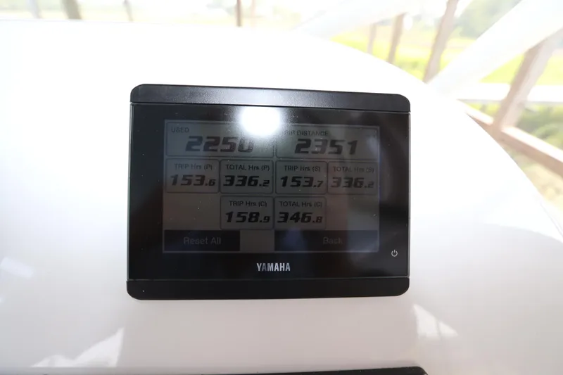 Slide: The Image of 2024 Albemarle 30 Express helm with Garmin displays and joystick controls. - 50