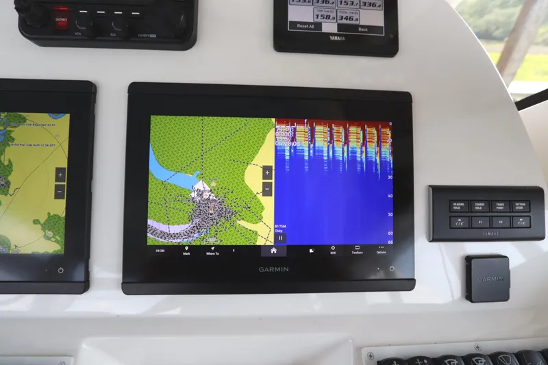 Slide: The Image of Garmin navigation display on 2024 Albemarle 30 Express boat, showing radar and map interface. - 53