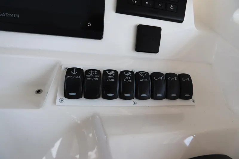 Slide: The Image of ICOM VHF Marine IC-M510 radio on 2024 Albemarle 30 Express boat dashboard. - 57