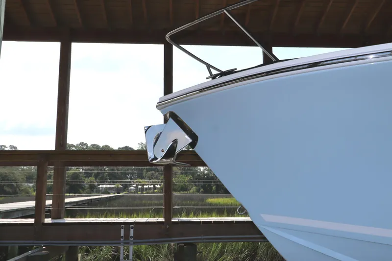 Slide: The Image of 2024 Albemarle 30 Express boat hull in light blue on a lift. - 6