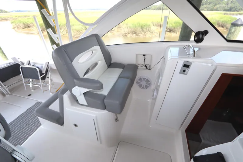 Slide: The Image of Lenco trim tab control panel on 2024 Albemarle 30 Express boat. - 60