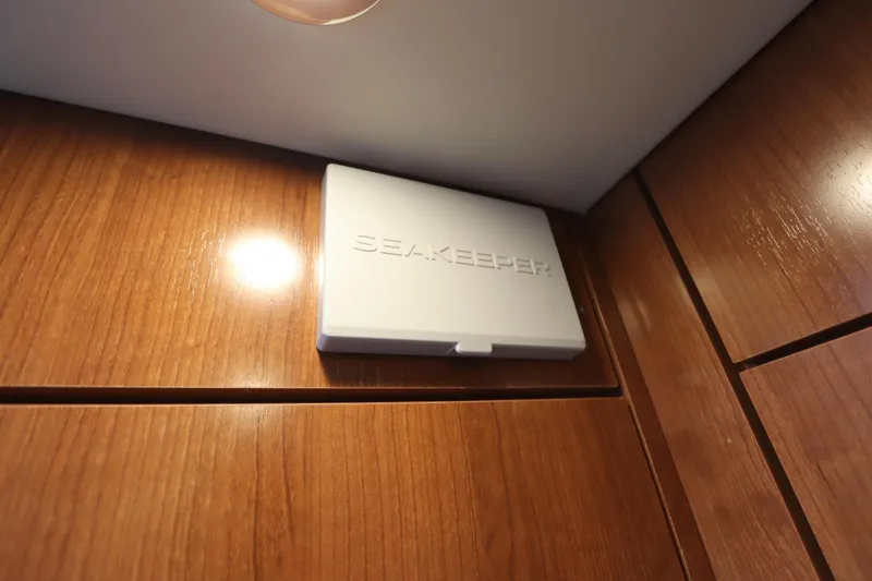 Slide: The Image of Dometic control panel on 2024 Albemarle 30 Express boat interior. - 69