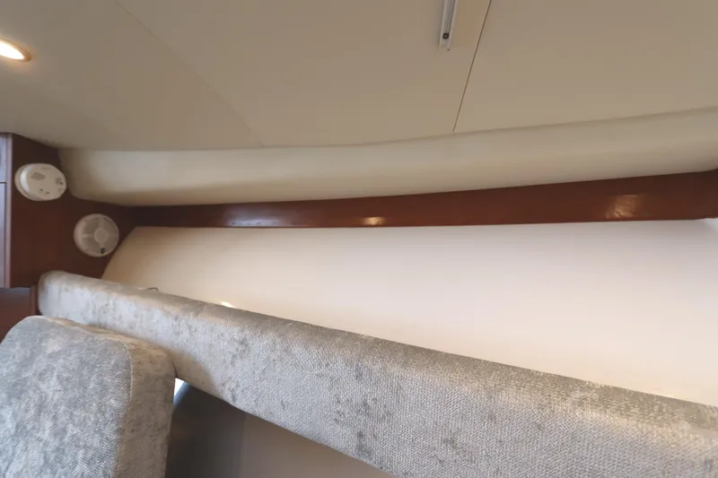 Slide: The Image of Interior view of 2024 Albemarle 30 Express boat with wooden trim and ceiling light. - 75