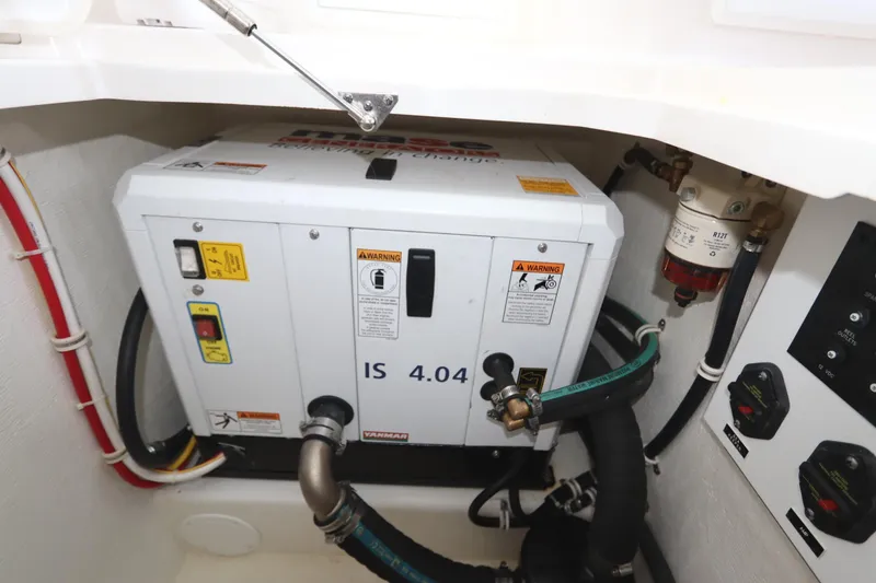 Slide: The Image of Engine compartment of 2024 Albemarle 30 Express boat, showcasing mechanical components. - 78