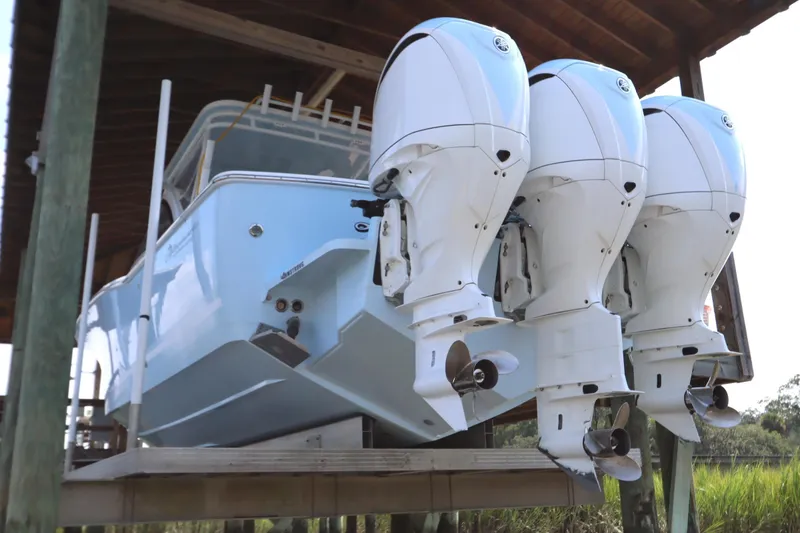 Slide: The Image of 2024 Albemarle 30 Express boat detail with Armstrong bracket, showcasing sleek design. - 8