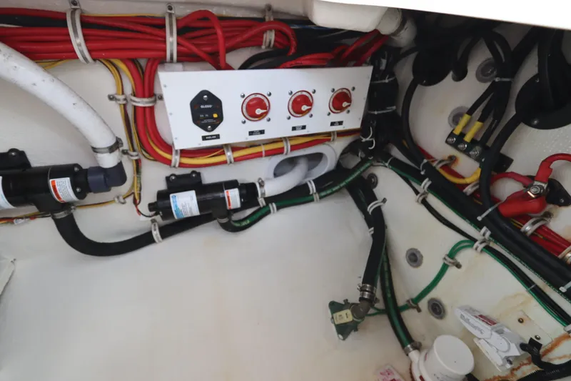 Slide: The Image of Electrical panel and wiring inside 2024 Albemarle 30 Express boat. - 81