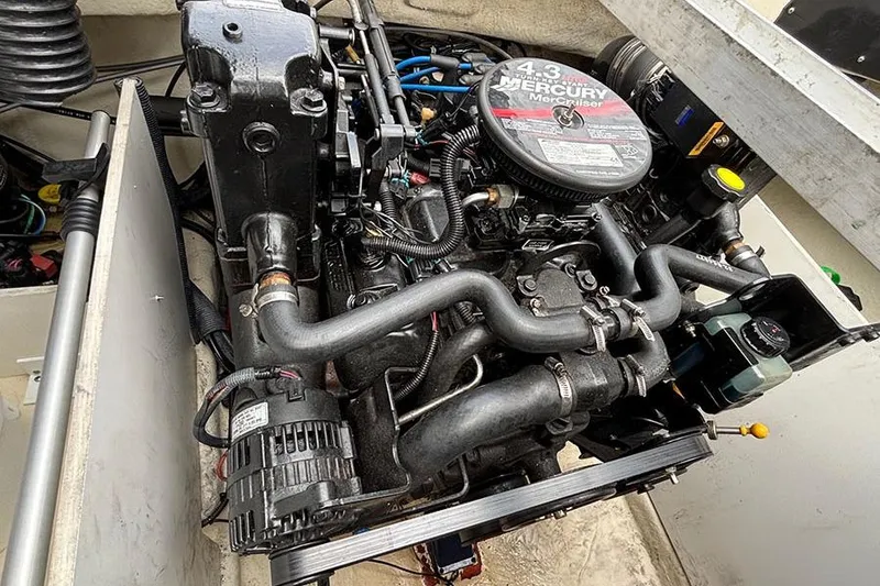 Slide: The Image of 2008 Sea Ray 185 Sport engine, featuring a 4.3L Mercury MerCruiser motor. - 11